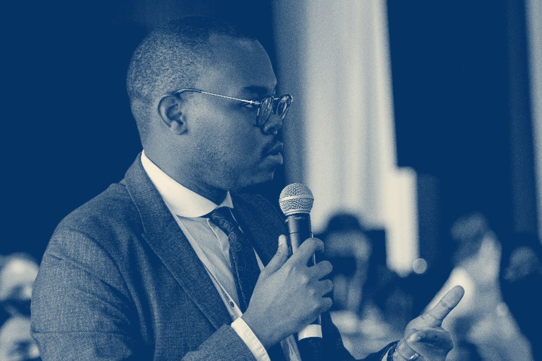 Addressing delegates from the floor at an international congress